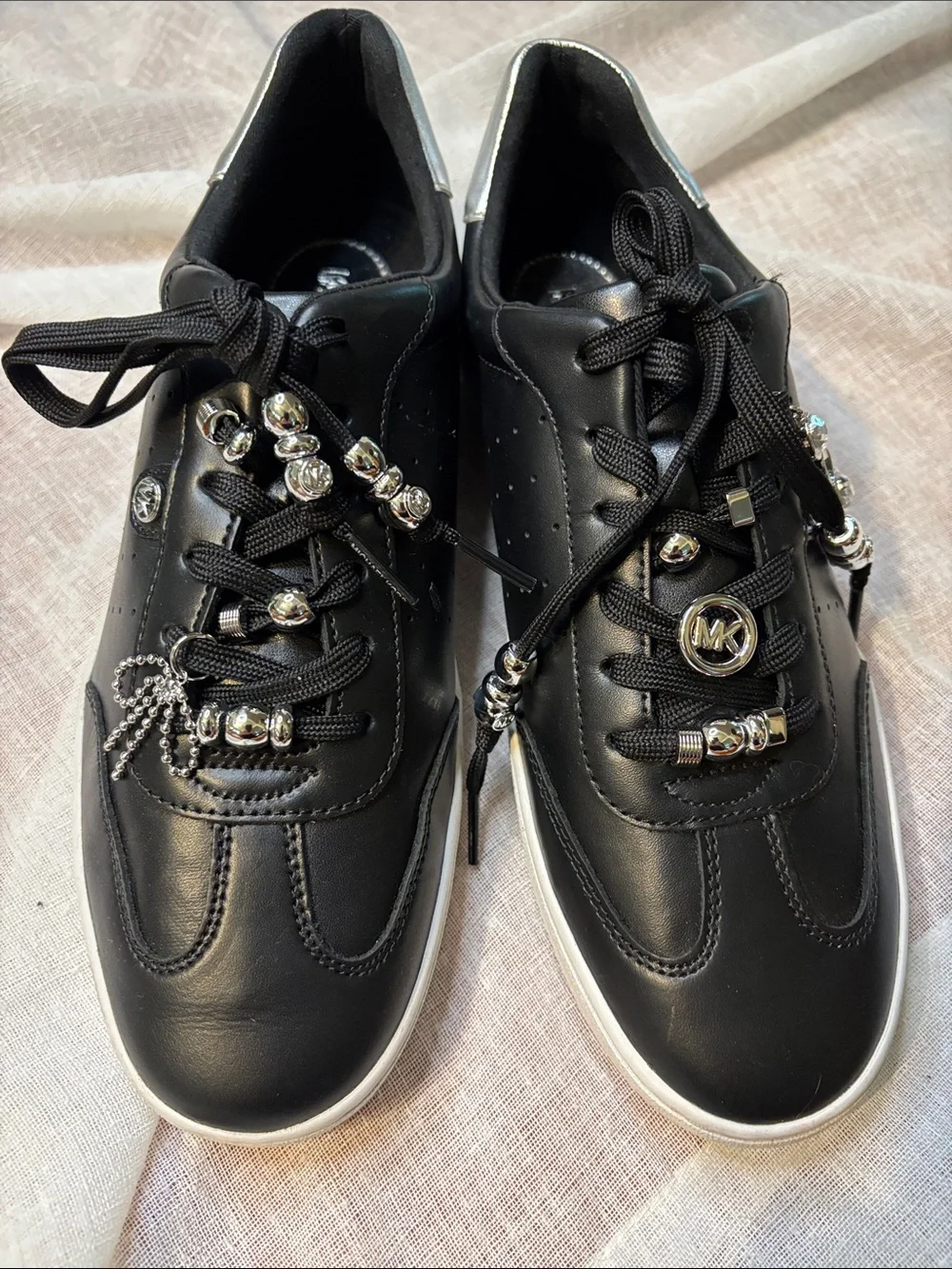 Michael Kors Black Leather Sneakers with Silver Charms